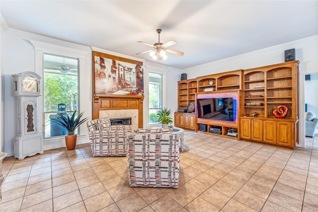 living room featuring crown molding, plenty of natural light, and light tile patterned floors