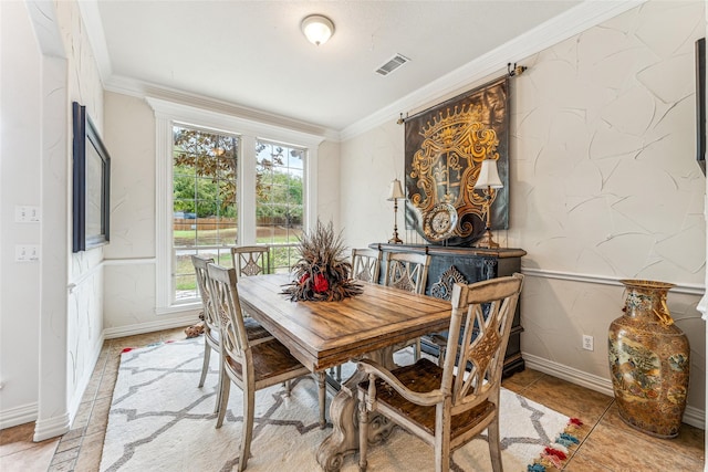 dining room featuring ornamental molding