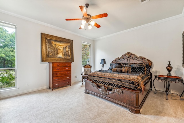 carpeted bedroom with multiple windows, crown molding, and ceiling fan