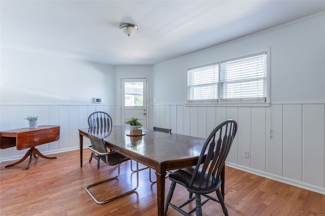 dining room with wood-type flooring