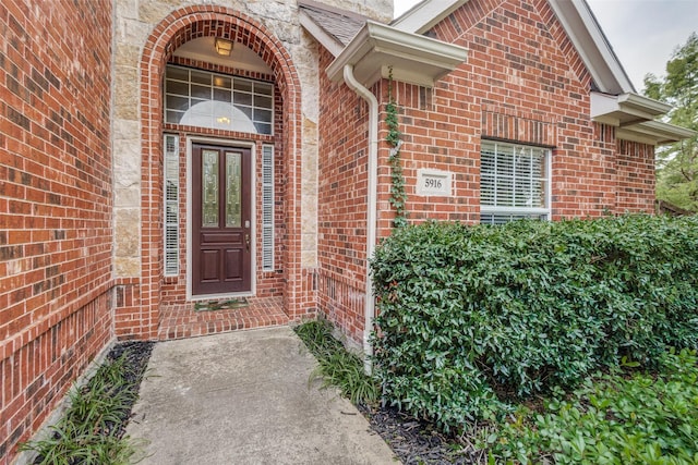 5916 Lavon Dr, Flower Mound, TX 75028 - doorway to property with brick siding