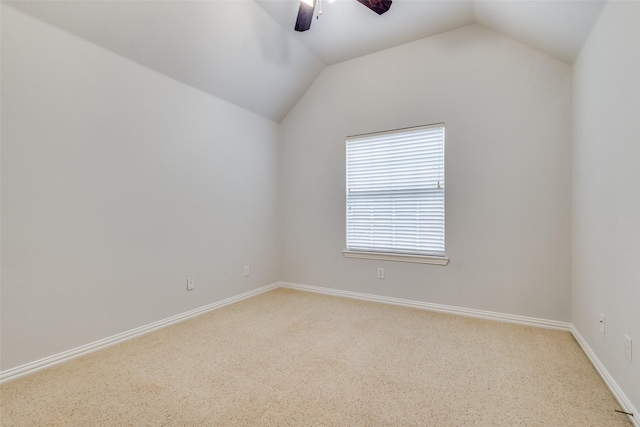 unfurnished room with lofted ceiling and ceiling fan