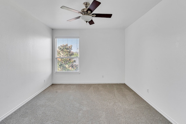 unfurnished room featuring carpet floors and ceiling fan