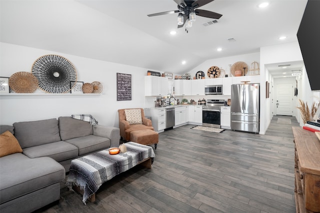 living area featuring vaulted ceiling, recessed lighting, ceiling fan, dark wood-style floors, and visible vents