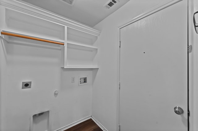 laundry area featuring gas dryer hookup, wood-type flooring, washer hookup, and hookup for an electric dryer