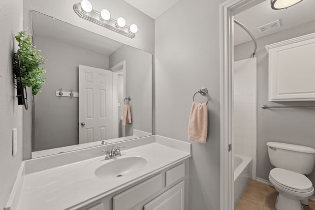 full bathroom with shower / tub combination, vanity, toilet, and tile patterned floors