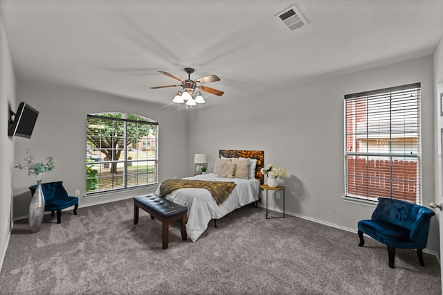 bedroom featuring ceiling fan and carpet floors