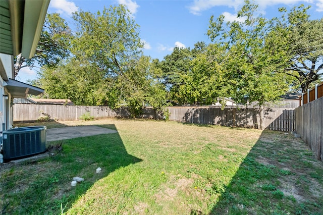 view of yard with a patio and cooling unit