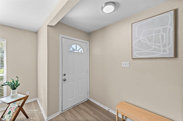 foyer with light hardwood / wood-style floors