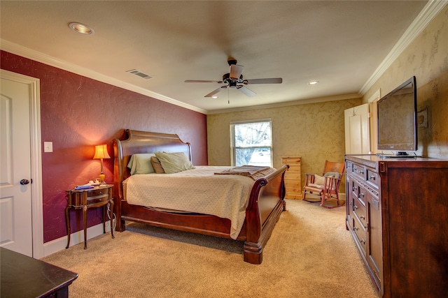 bedroom with ornamental molding, light colored carpet, and ceiling fan