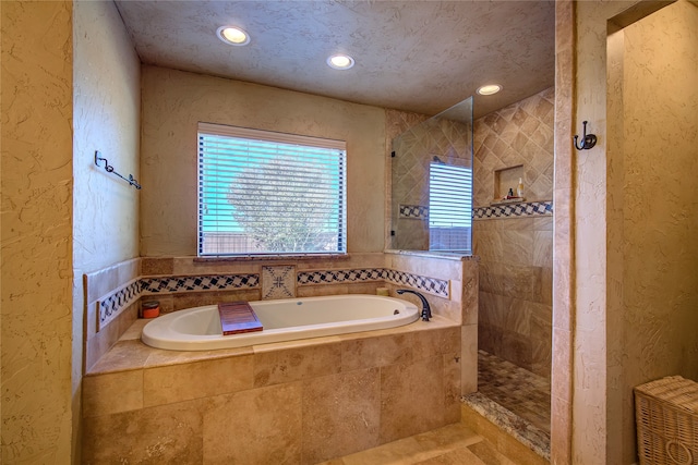 bathroom featuring plus walk in shower