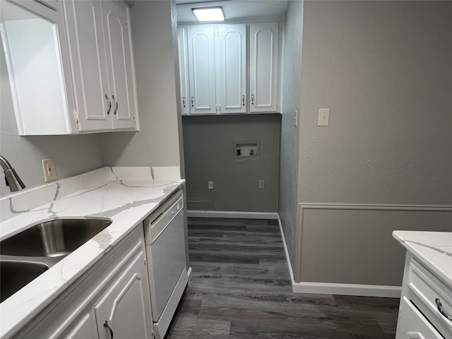 laundry room with sink, cabinets, dark hardwood / wood-style floors, and hookup for a washing machine