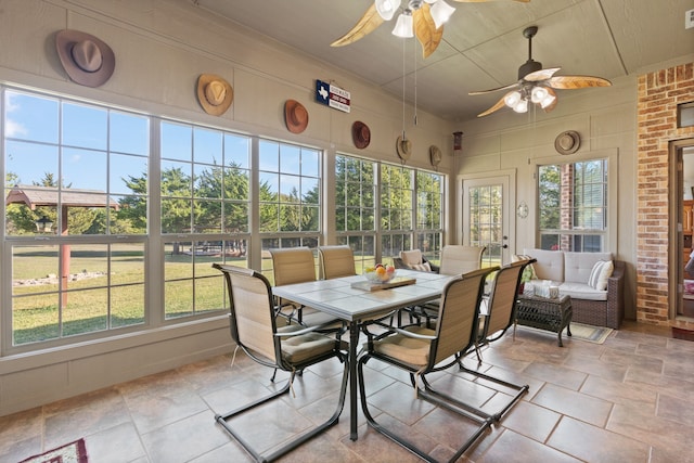 sunroom / solarium with ceiling fan