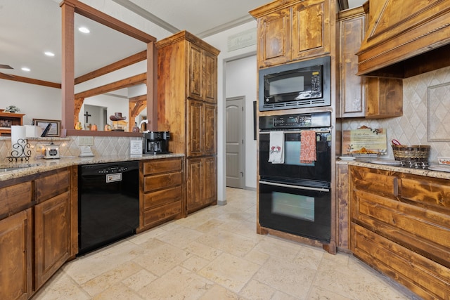 kitchen featuring backsplash, ornamental molding, black appliances, premium range hood, and light stone counters