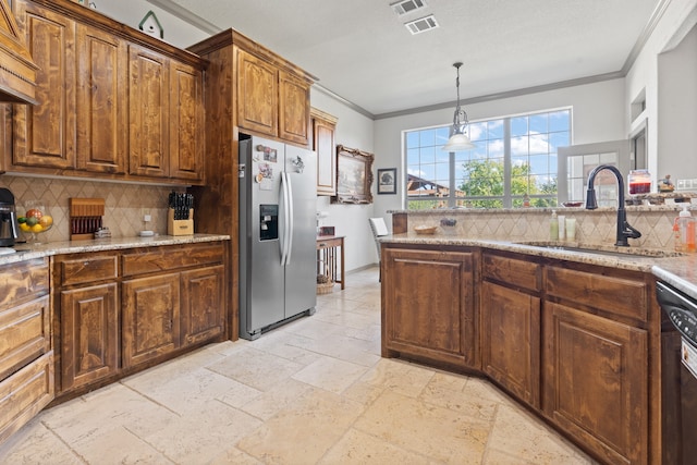 kitchen featuring crown molding, tasteful backsplash, sink, and stainless steel refrigerator with ice dispenser