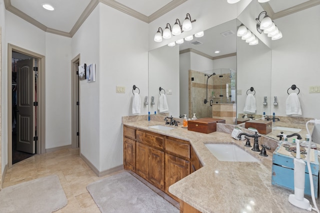 bathroom featuring vanity, crown molding, tile patterned flooring, and walk in shower