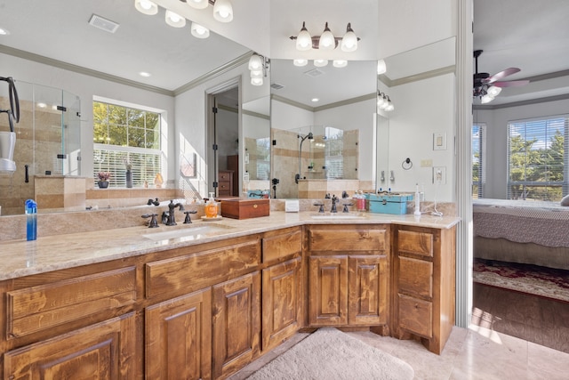 bathroom with a shower with shower door, ceiling fan, vanity, crown molding, and hardwood / wood-style flooring