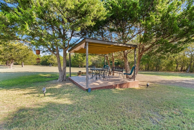 view of yard featuring a wooden deck