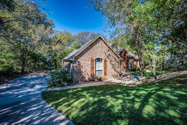 view of property exterior featuring a yard