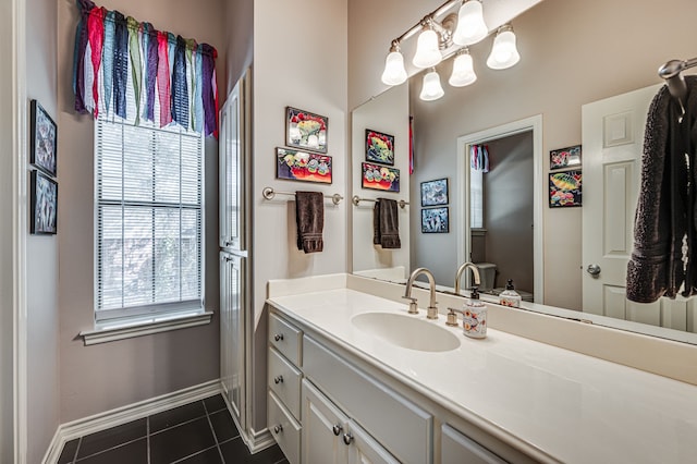 bathroom with vanity and tile patterned flooring