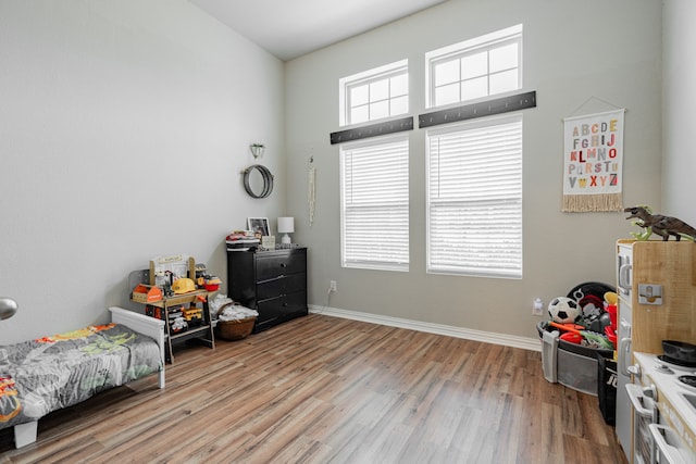 bedroom featuring light hardwood / wood-style floors