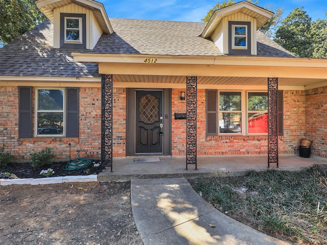 entrance to property with covered porch