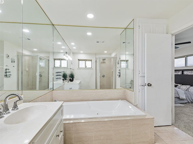 bathroom with vanity, separate shower and tub, and tile patterned flooring