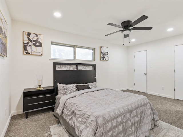 carpeted bedroom with ceiling fan