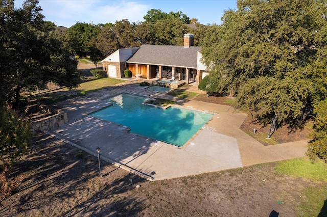 view of pool featuring a patio area