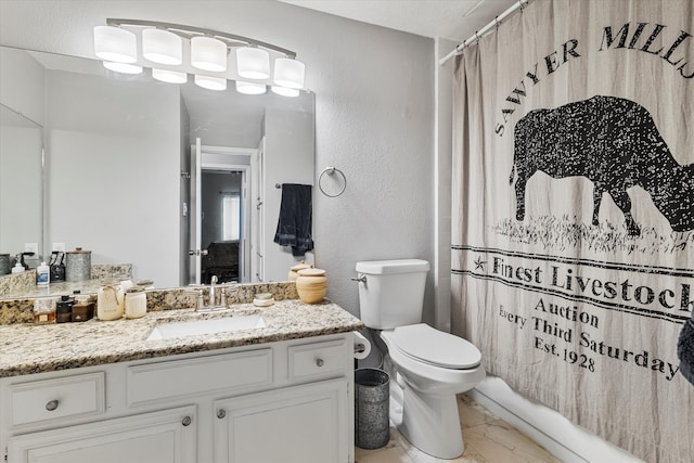 full bathroom with vanity, toilet, and shower / bath combination with curtain