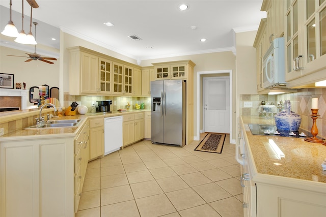 kitchen with white appliances, sink, decorative backsplash, hanging light fixtures, and ornamental molding