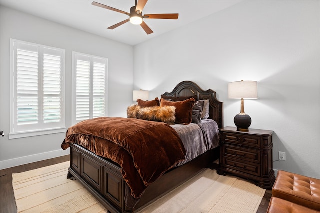 bedroom featuring light wood-type flooring and ceiling fan