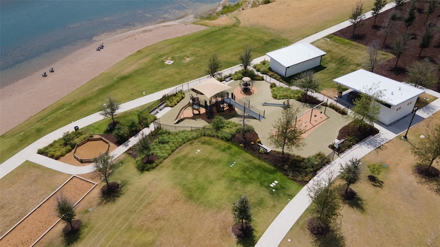 birds eye view of property with a water view