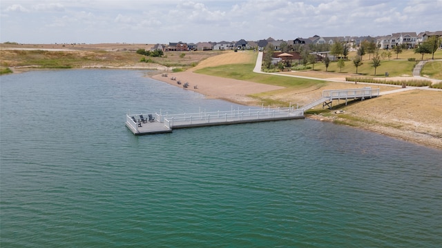 view of water feature with a dock