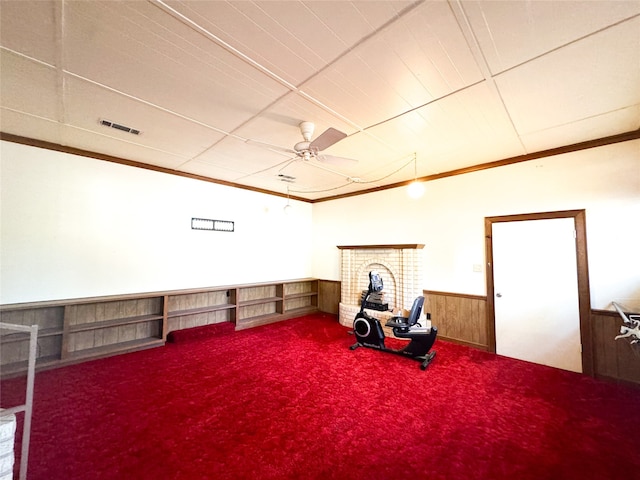 miscellaneous room with ornamental molding, carpet floors, and ceiling fan