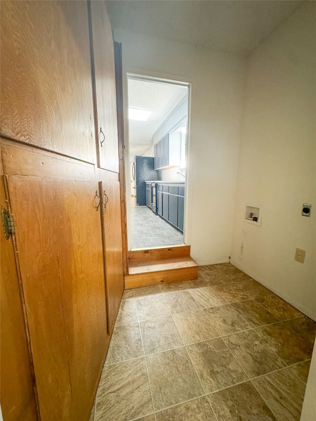 laundry room with hookup for an electric dryer and washer hookup