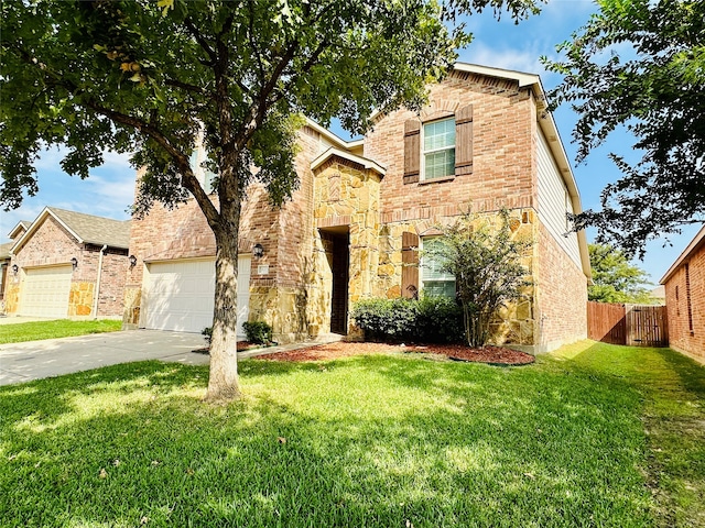 view of front of home featuring a garage and a front yard