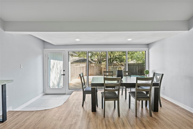 dining room with light hardwood / wood-style flooring