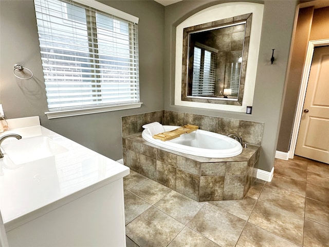 bathroom with vanity, tile patterned floors, and plus walk in shower