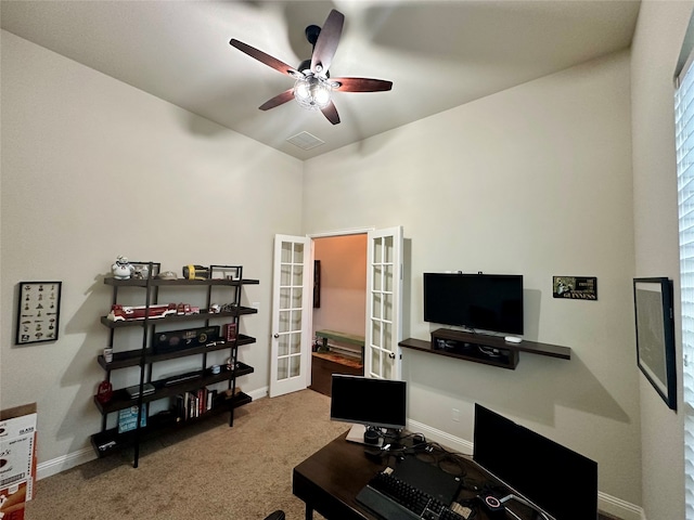 office with carpet flooring, french doors, and ceiling fan