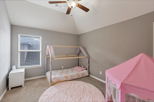 bedroom with light colored carpet, ceiling fan, and vaulted ceiling