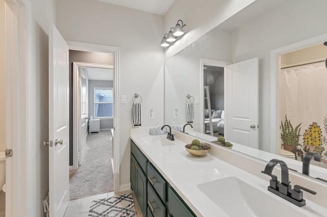 bathroom featuring vanity and tile patterned flooring