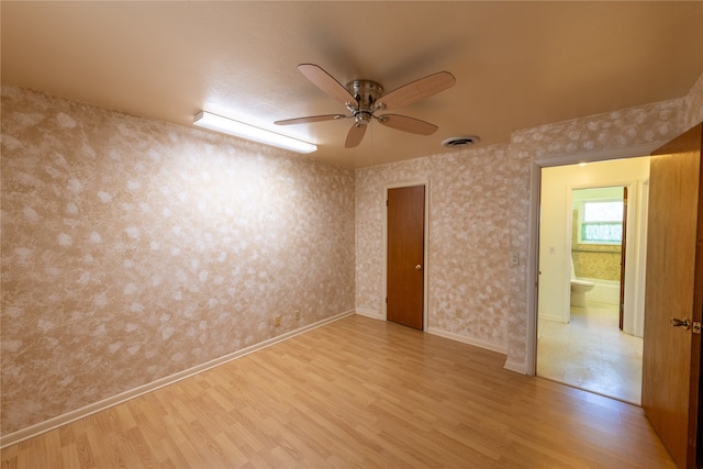 unfurnished room featuring wood-type flooring and ceiling fan