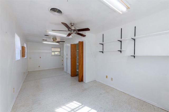 empty room featuring ceiling fan