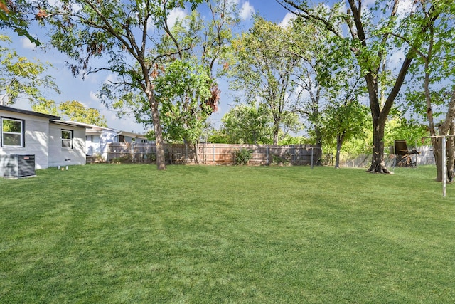 view of yard featuring central AC