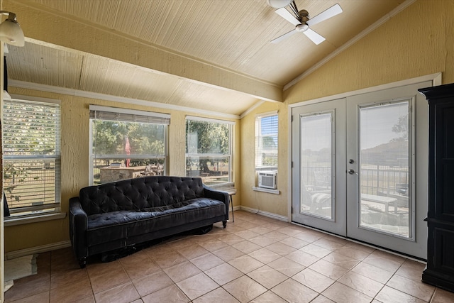 sunroom / solarium featuring french doors, ceiling fan, and vaulted ceiling