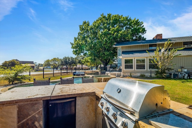 view of patio / terrace featuring a grill