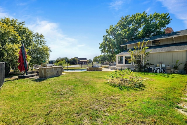 view of yard with a patio area and a swimming pool