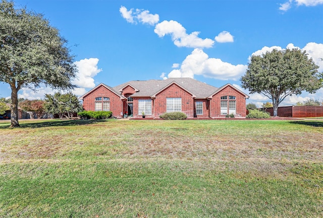 ranch-style house with a front yard