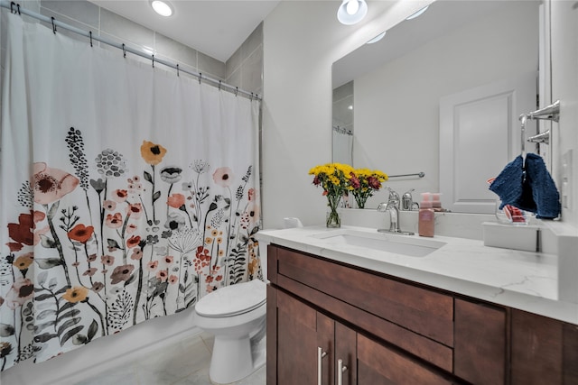 full bathroom featuring vanity, shower / bath combination with curtain, toilet, and tile patterned flooring